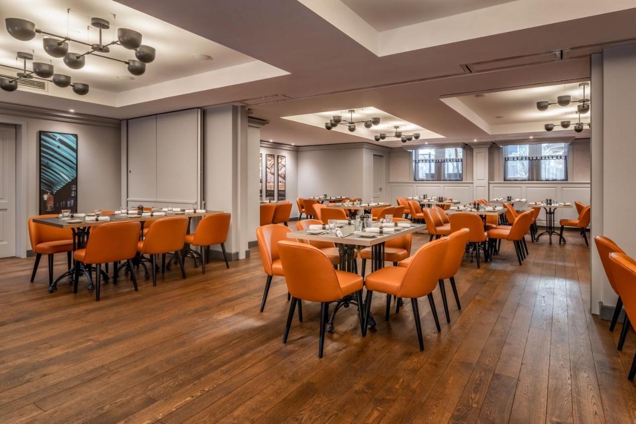 Cologne Marriott Hotel Bagian luar foto The dining room at the restaurant